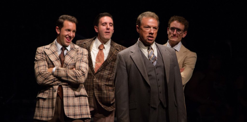 Paul Schoeffler as Franklin Hart Jr and company in 9 to 5, The Musical produced by Music Circus at t