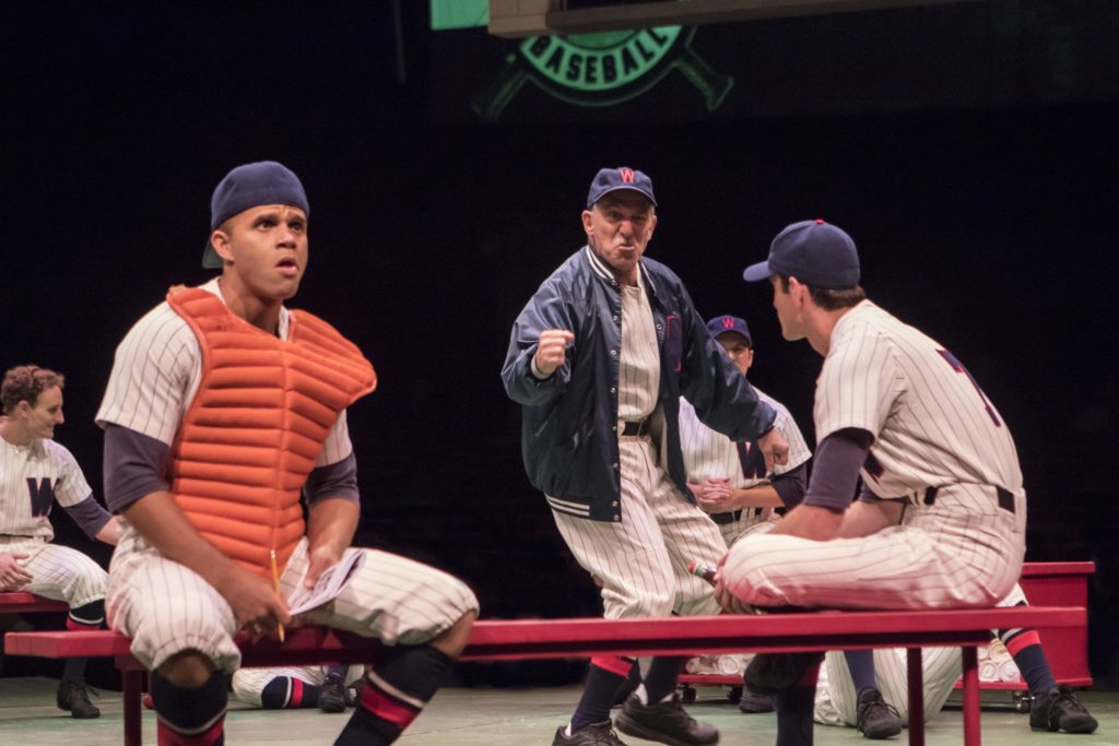 Justin Keyes as Smokey, Stephen Berger as Van Buren and the company of Damn Yankees produced by Musi