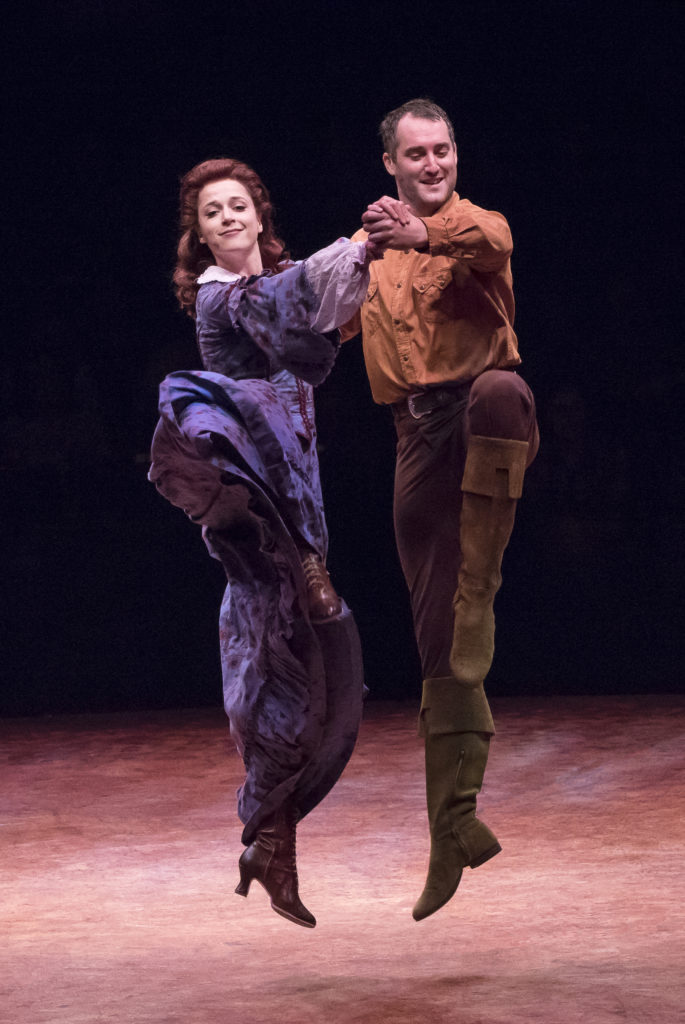 (from L to R) Paige Faure as Milly and Eric Stretch as Benjamin Pontipee in SEVEN BRIDES FOR SEVEN B