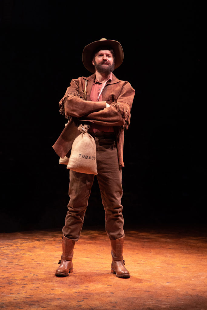 Edward Watts as Adam Pontipee in SEVEN BRIDES FOR SEVEN BROTHERS, produced by Broadway At Music Circ