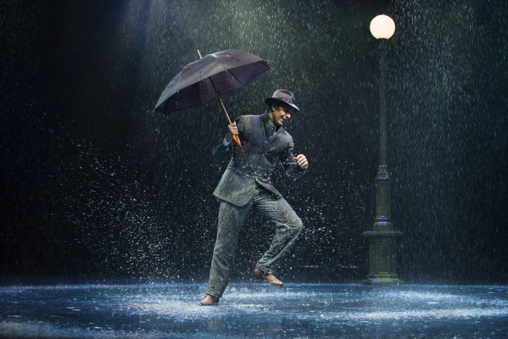 Noah Racey as Don Lockwood in SINGIN' IN THE RAIN, produced by Broadway At Music Circus at the Wells