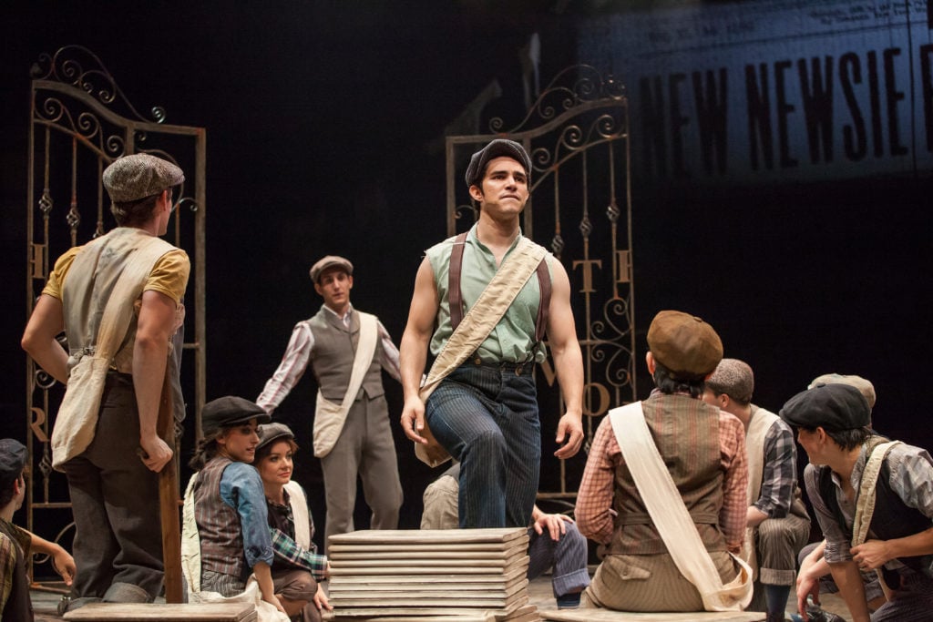 (center from L) John Krause as Davey and Joey Barreiro as Jack Kelly with the Company of DISNEY’S NE