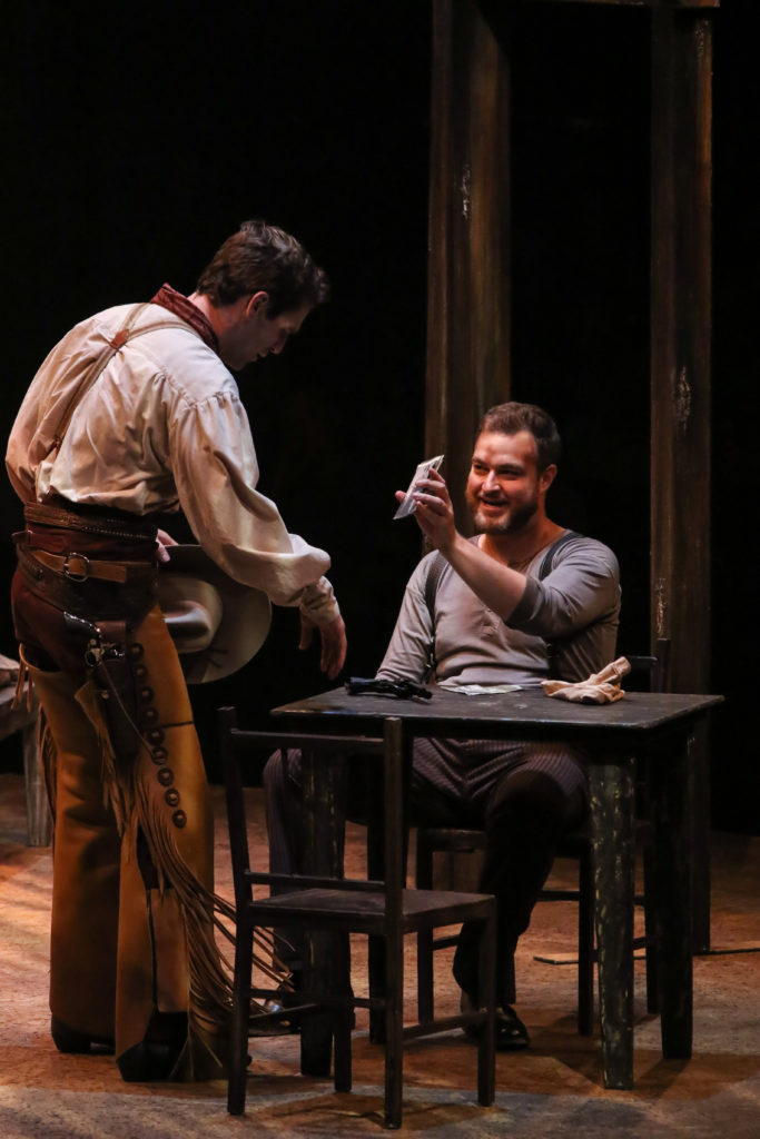 Ryan Vasquez as Curly McLain and John Rapson as Jud Fry in OKLAHOMA! produced by Broadway At Music Circus at the Wells Fargo Pavilion June 25-30. Photo by Charr Crail.