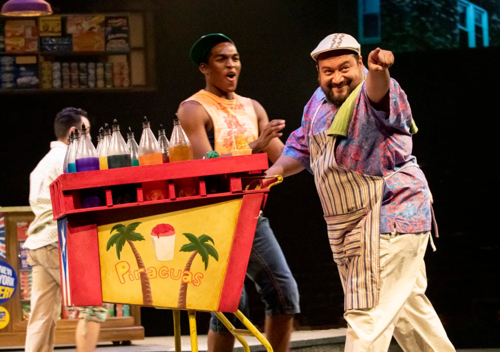 James Anthony and David Baida as the Piragua Guy in the Broadway At Music Circus production of IN THE HEIGHTS at the Wells Fargo Pavilion August 20-25. Photo by Charr Crail.