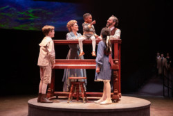 (L to R) Benjamin Pajak as The Little Boy, Teal Wicks as Mother, Kyle Thompson as Coalhouse Walker III, Heidi Motter as The Little Girl, Josh Grisetti as Tateh and the company in the Broadway At Music Circus production of RAGTIME at the UC Davis Health Pavilion August 8-13. Photo by Kevin Graft.